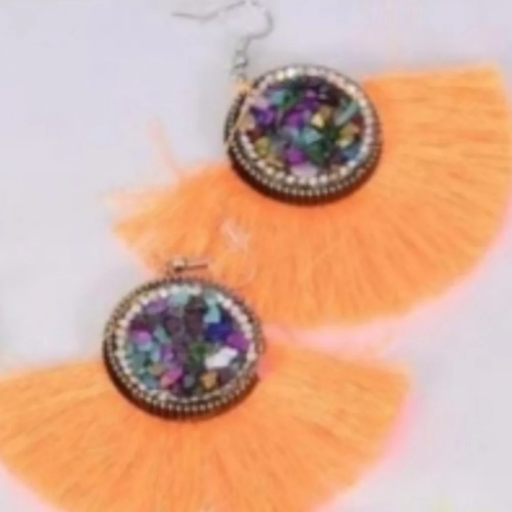 Reformation tassel fan